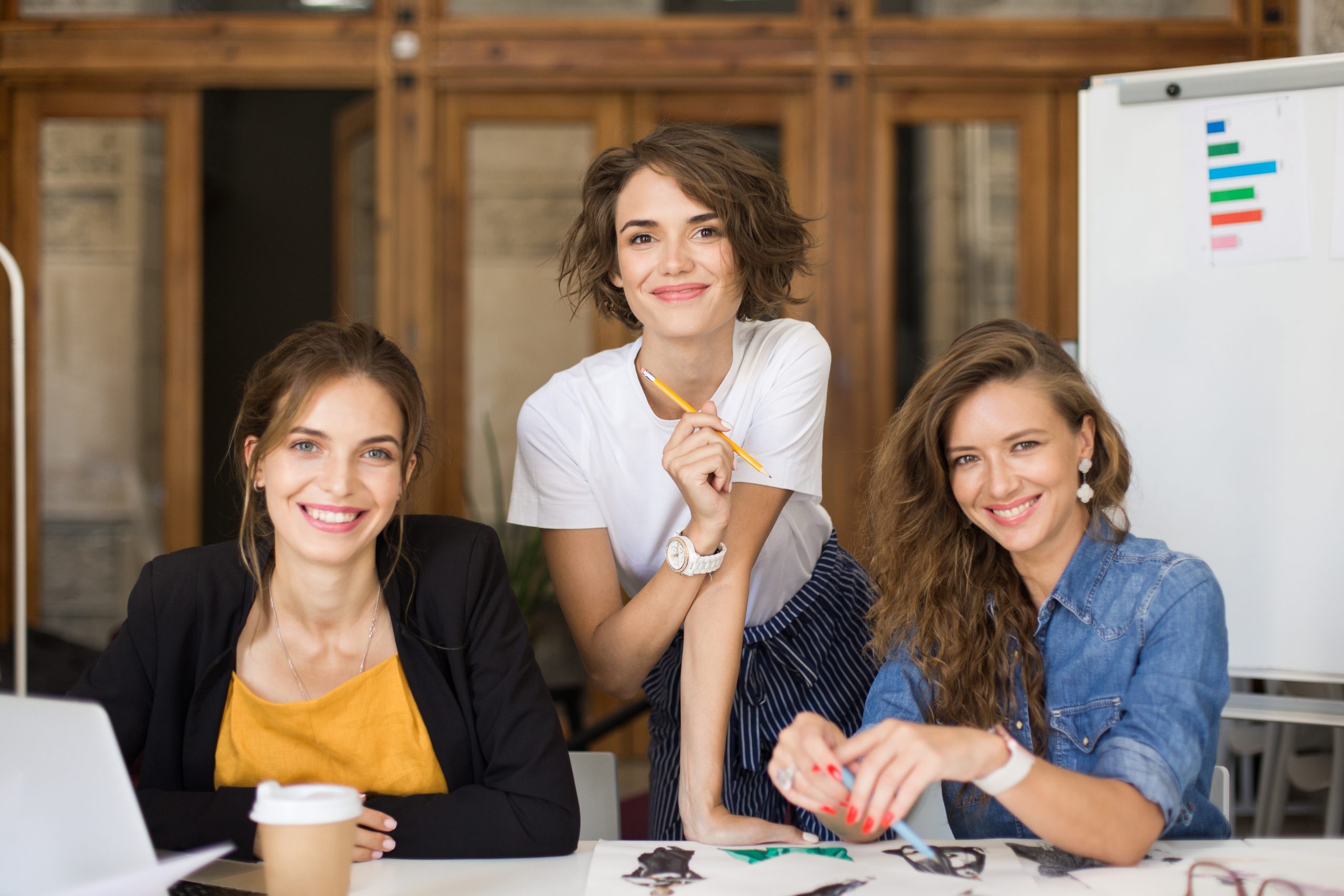 young-cheerful-women-happily-looking-camera-while-spending-ti